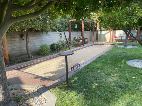 Cornhole Pit Backyard, Petanque Court Ideas, Backyard Bacci Ball Court, Bocce Ball Court Backyard, How To Build A Bocce Ball Court, Modern Bocce Ball Court, Cornhole Court, Airbnb Backyard, Bocce Ball Court Backyard Dimensions