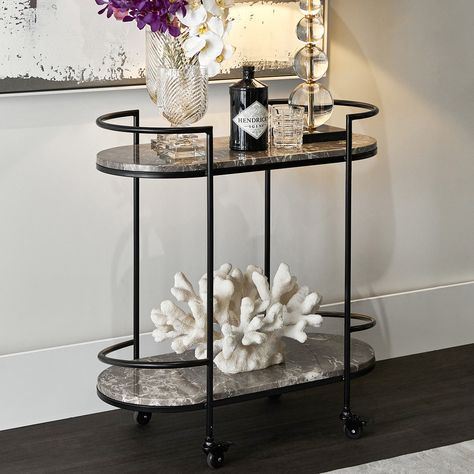 The Sundance drinks trolley is pure elegance on wheels! 😍🍸 #indoor #indoorkitchen #dining #trolley #barcart #home Black Bar Cart, Marble Shelves, Deco Buffet, Marble Shelf, Marble Bar, Serving Trolley, Bar Cart Styling, Drinks Trolley, Interiors Online