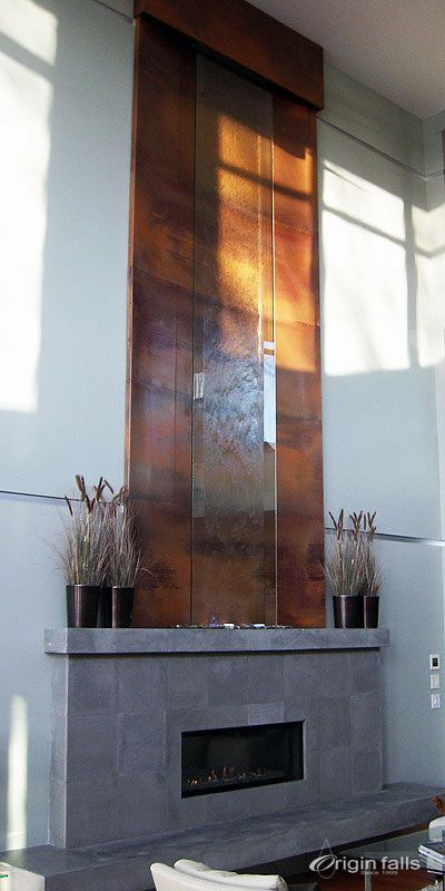 Custom stainless steel and glass indoor waterfall for a home in Kelowna BC Canada Indoor Waterfall Wall, Indoor Waterfall Fountain, Indoor Wall Fountains, Home Beauty Salon, Indoor Water Features, Inside A House, Condo Living Room, Indoor Waterfall, Front Garden Design