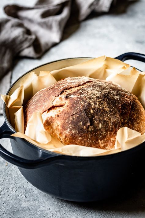 Even the most intimidated bread baker can feel confident with this No Knead Artisan Bread recipe. Adapted from NYT No Knead bread recipe, all you need is a dutch oven and 24 hours of time. #foolproofliving #nokneadbread #bread #breadbaker #baking Pane Alle Olive, Dutch Oven Bread, Knead Bread Recipe, Olive Bread, Sprouted Grains, Artisan Bread Recipes, Knead Bread, Bread Baker, Loaf Of Bread