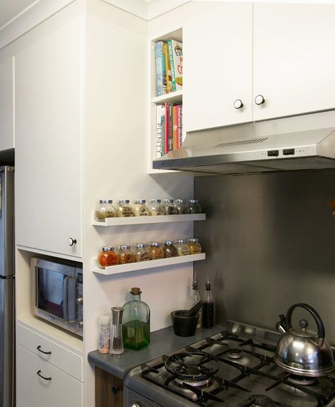 The Hiding-in-Plain-Sight Stor Space You're Not Using — Small-Space ...Kitchens ... all she needed was a narrow picture ledge (from IKEA, of course) in order to create just enough space for a row of spices right by her stovetop. Backsplash Storage, Organiser Cucina, Ikea Spice Rack, Kitchen Ikea, Kabinet Dapur, Small Kitchen Storage, Ikea Shelves, Household Organization, Ikea Hacks