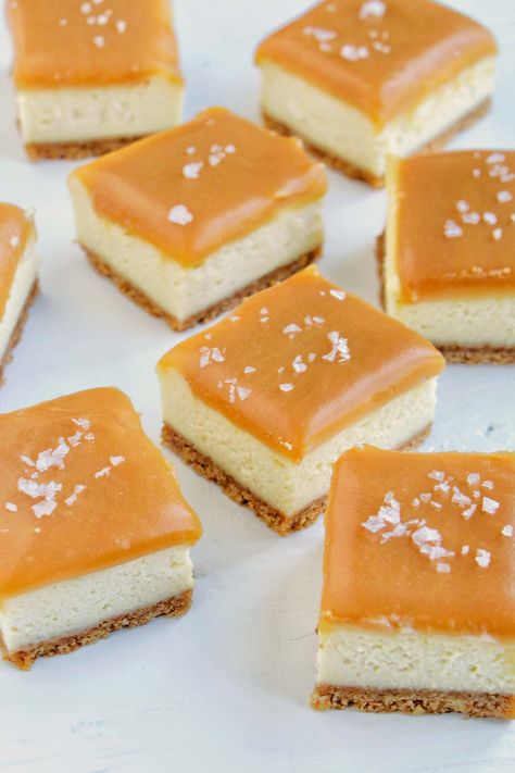 I just made these salted caramel cheesecake bars for a fall bonfire that my friends hosted and everyone was obsessed with these! All of the bars in the 9x9 baking pan were gone at the end of the night. It's the perfect balance of salty and sweet. This was such an easy recipe to make! This would be the perfect easy dessert recipe for a birthday party or even as an alternative to pie for Thanksgiving dinner. The cheesecake was so creamy and had amazing flavor! Holiday Cheesecake Bars, Salted Caramel Cheesecake Bars, Grazing Table Shopping List, Layered Cheesecake, Popcorn Dessert, Cranberry Cheesecake Bars, Caramel Cheesecake Bars, Pie For Thanksgiving, Holiday Cheesecake