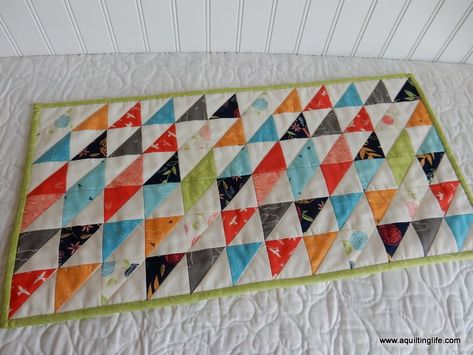 Half Square Triangle Table Runner Tutorial Half Square Triangle Table Runner, Triangle Table Runner, Triangle Table, A Quilting Life, Table Runner Tutorial, Simple Quilt, Half Square Triangle, Quilt Projects, Table Runner And Placemats