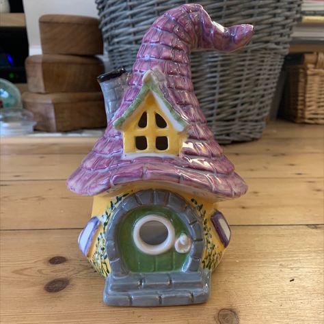 Painted pottery gnome house with purple roof yellow walls and tiny flowers Ceramic Gnome House, Fairy House Pottery Painting, Gnome House Painting, Pottery Lanterns, Pottery Painting Studio, Artsy Crafts, Gnome Home, Ceramic Lantern, Pottery Houses