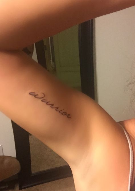 New #warrior #tattoo ❤️ Warrior Tattoos Word, Warrior Quote Tattoos For Women, Warrior Tattoo Female, Warrior Word Tattoo, Thursday Tattoo, The Word Survivor Tattoo, Fighter Tattoo Woman, Warrior Cursive Tattoo, Warrior Text Tattoo