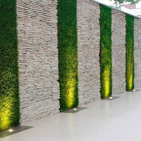 Go crazy with this Boundary wall decor !!! #naturalstone #wallcladding by #stoneideas ... #homedecor #udaipur #tiles #walltiles #decorations #nature #indianstone www.stone-ideas.in Garden Lighting Design, Stone Walls Garden, Moderne Have, Vertical Garden Design, Landscaping Flowers, Vertical Gardens, Desain Lanskap, Walled Garden, Stone Walls