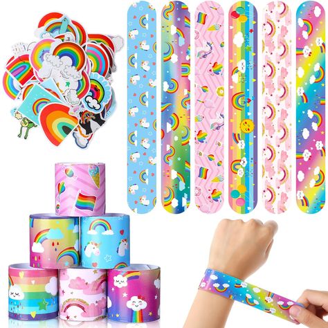 PRICES MAY VARY. Rainbow Party Supplies: you will get 30 pieces rainbow slap bracelets in 6 different styles, and 50 pieces rainbow cloud stickers; Adorable rainbow slap bracelets and stickers, kids will love wearing as enchanting accessories or sharing with friend Colorful Rainbow Design: the rainbow cloud party favors are designed with cute rainbow clouds and unicorn patterns, in diverse colors, adding a colorful touch to your rainbow themed birthday party; The rainbow party bag fillers will a Cloud Party Decorations, Rainbow Party Favors, Kids Party Bags Fillers, Rainbow Unicorn Birthday Party, Rainbow Party Supplies, Cloud Party, Rainbow Themed Birthday Party, Stickers Rainbow, Rainbow Party Decorations