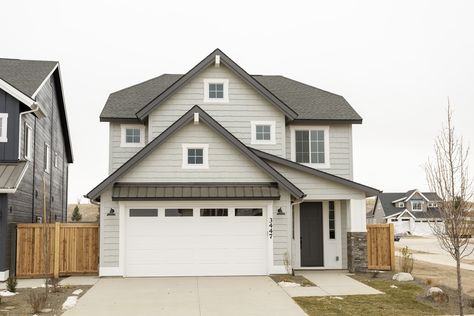 The Juniper, two-story home by Alturas Homes Argos Sherwin Williams Exterior, Peppercorn Trim Exterior, Sherwin Williams Argos, Argos Sherwin Williams, Exterior Door Paint, Walnut House, Outside House Paint, Garage Door Trim, Reno House