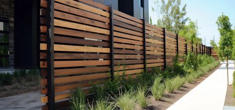 Privacy Fence Ideas: Enhance Your Outdoor Space With These Options Backyard Privacy Fence, Moroccan Courtyard, Slat Fence, Horizontal Slat Fence, Privacy Fence Ideas, Fence Options, Wood Fence Design, Natural Fence, Horizontal Fence