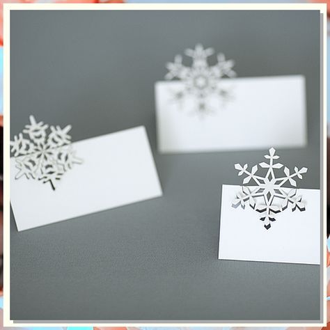 Looking for creative winter wedding place card ideas to add charm and elegance to your special day? Look no further! From rustic pinecone place cards to elegant snowflake designs, we've curated a list of 10 unique ideas that will make your winter wedding unforgettable. Find inspiration and get ready to impress your guests with these stunning winter wedding place cards. Plane Paper, Laser Cut Snowflake, Stationary Wedding, Winter Wedding Table, Place Card Table Wedding, Christmas Place Cards, Laser Paper, Christmas Place, Christmas Entertaining