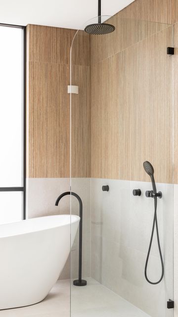 ABI Interiors UK on Instagram: "See how matte black fixtures can bring definition to a modern space. ⁠ ⁠ Illuminated by a generous circular skylight, this bathroom adopts the sleek finish as a striking accent. ⁠ ⁠ It adds a sense of seriousness to the grey and timber palette, balancing the overall scheme to deliver a versatile space. ⁠ ⁠ Project by: @veriview⁠ 📹️ by: @abiinteriors_uk" Circular Skylight, Matte Black Fixtures, Master Shower Tile, Black Tapware, Japandi Bathroom, Abi Interiors, Black Fixtures, House Renos, Space Project