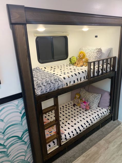 Bunk bed in RV with Beddys bedding Camper Bunk Room Storage Ideas, Campers With Bunk Room, Small Camper Bunkhouse Remodel, Camper Master Bed Decor, Rv Mid Bunk Remodel, Camper Bunks Remodel, Rv Bunkhouse Ideas, Rv Midbunk Renovation, Camper Bunk Bed Remodel