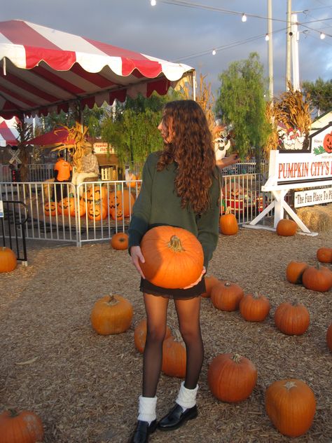 Pumpkin patch, fall aesthetic, pumpkin patch outfit, skirt and sweater, loafers, leg warmers, autumn, pumpkin, pumpkin city, cozy outfit Outfits To Wear To The Pumpkin Patch, Pumpkin Patch Fit Ideas, Cozy Pumpkin Patch Outfit, Pumpkin Patch Outfit Goth, Pumpkin Patch Outfit Skirt, Pumpkin Farm Outfit Women, Pumpkin Festival Outfit, Pumpkin Patch Outfit 2024, Pumpkin Patch Outfit Aesthetic