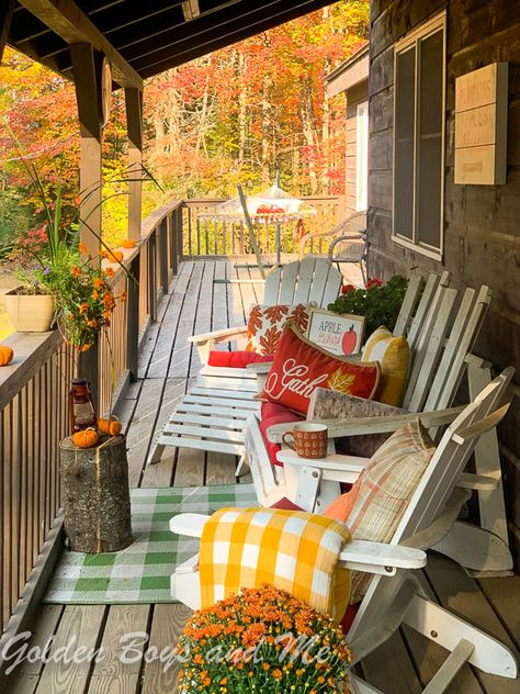 Fall foliage with autumn decor on front porch of rustic mountain cabin - www.goldenboysandme.com Fall Cabin Decor, Mountain Cabin Decorating Ideas, Cabin Porch Decor, Decorating A Cabin, Cabin Porch Ideas, Cabin Decorating Ideas, Fall Cabin, Cozy Cabin Decor, Cabin Home Decor