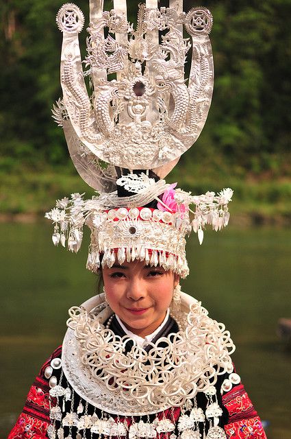 A Miao woman in China in festival dress * 1500 free paper dolls at international artist Arielle Gabriels The International Paper Doll Society also free Chinese paper dolls The China Adventures of Arielle Gabriel * Silver Headdress, Women In China, Miao Silver, Yunnan China, Eric Lafforgue, Steve Mccurry, Adventure Lifestyle, We Are The World, Folk Costume