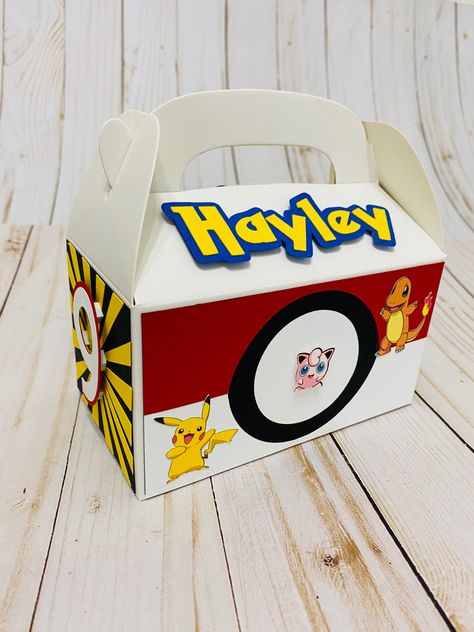 Pikachu Goodie Bags, Pokemon Candy Bar Ideas, Pikachu Box Diy, Pokemon Favor Boxes, Pokemon Favor, Pokemon Candy, Pokemon Themed Party Walmart, Pokemon Party, Pokemon Birthday