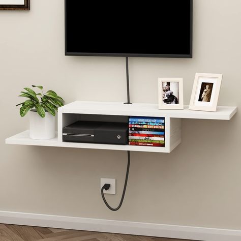 PRICES MAY VARY. 【Unique Asymmetrical Design】This wall TV stand with an attractive unique asymmetrical design, wall-mounted use can save room space. The wire holes are designed keep your standtop neatly organized. 【Stable and Reliable】This wood TV stand with high MDF material, a uniform structure, which makes it sturdy, waterproof and easy to clean. 【Multipurpose Use】The media console is a suitable living room bedroom or home office for storage electronic devices such as routers, set-top boxes, Mounted Tv Ideas Bedroom, Mounted Tv Bedroom, Under Tv Shelf, Mounted Tv Decor, Tv Stand Shelf, Twin Boys Room, Floating Shelf Under Tv, Wall Mount Tv Shelf, Console For Living Room