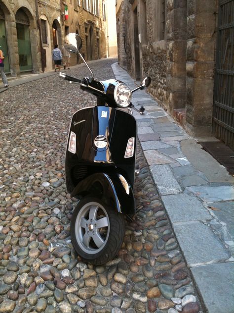 black Vespa in Verona Dark Academia Love, Black Vespa, Vintage Volkswagen Bus, Dark Academia Books, Vintage Volkswagen, Mopeds, Volkswagen Bus, Black Aesthetic, Verona