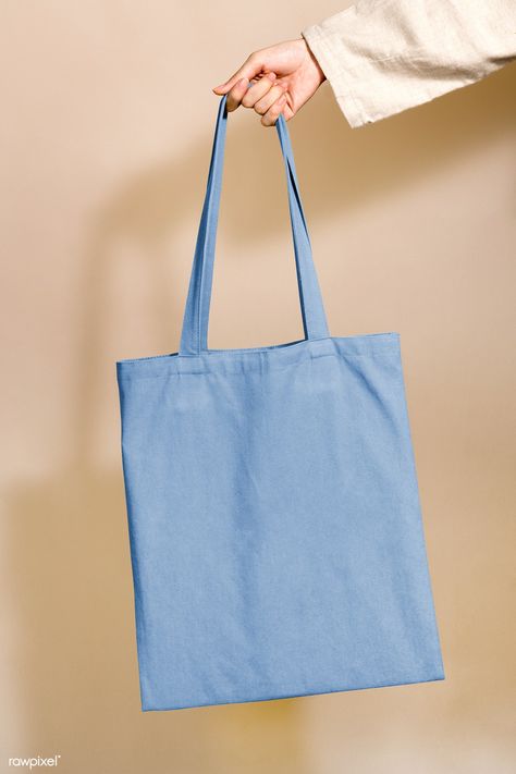 Woman holding a blue tote bag in her hand | premium image by rawpixel.com / Jira Plain Canvas Tote Bag, Reusable Bags Design, Plain Tote Bag, Blank Tote Bag, 3d Crafts, Tote Bag Mockup, Cotton Jewelry, Bubbles Wallpaper, Blue Tote Bag