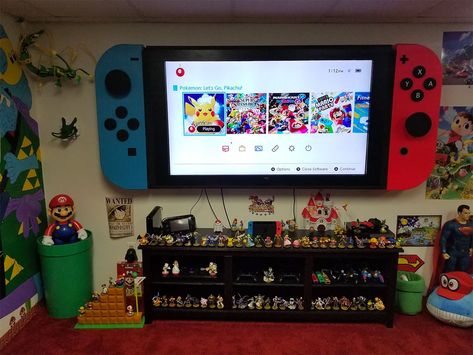 Tv made into giant Nintendo switch for game play room Nintendo Room, Mario Room, Video Game Room Design, Video Game Rooms, Geek Decor, Wall Mounted Cabinet, Gaming Room Setup, Gamer Room, Video Game Room