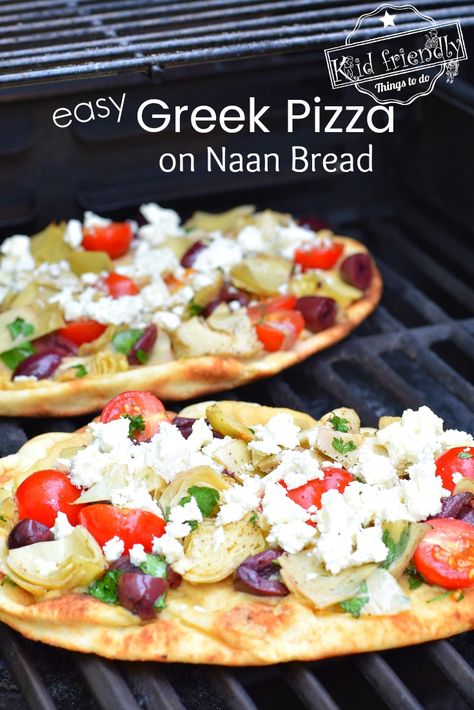 The best Greek Pizza Recipe. Easy to make on Naan (flatbread). Loaded with hummus, Feta cheese, Greek Olives, Delicious Artichokes and more. It's so easy to make and sure to be a big hit! www.kidfriendlythingstodo.com #greekpizza #pizza #grilled #easy #best #hummus #feta Naan Bread Pizza Recipe, Greek Pizza Recipe, Pizza Recipe Easy, Naan Bread Pizza, Flatbread Pizzas, Naan Pizza Recipes, Greek Pizza, Naan Flatbread, Recipe Bread