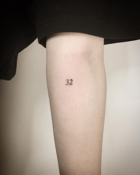 Tiny number 32 tattoo by Kirk Budden inked on the left forearm Black Armband, Z Tattoo, Number Tattoos, Shape Tattoo, Sick Tattoo, Geek Tattoo, Dainty Tattoos, Tattoo Meaning, Pattern Tattoo