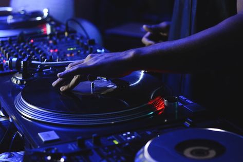 DJ Performing a Set playing with vinyl records on turntables at a night club. Video Setting, Video Effects, Crop Image, Concert Photography, Night Club, Vinyl Records, Stock Photography, Dj, Stock Photos