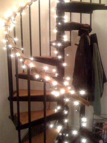 Spiral Staircase Wall Decor, Lights On Spiral Staircase, Spiral Staircase Decor, Staircase Wall Decor Ideas, Circle Stairs, Indoor Railing, Staircase Wall Decor, Stairway Decorating, Circular Stairs