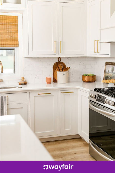 Find us a better kitchen setup, we'll wait. With a ceramic utensil holder, wooden serveware, and gold hardware, this look can be yours in no time. Wooden Serveware, Kitchen Setup, Kitchen Countertop Decor, Farmhouse Bathroom Remodel, Ceramic Utensil Holder, Mojo Jojo, Rental Kitchen, Countertop Decor, White Kitchens