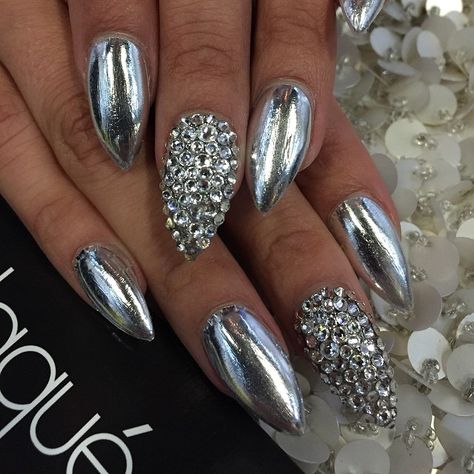 Chrome silver Stiletto nails☻ Silver And Chrome Nails, Silver Chrome And Glitter Nails, Chrome Bling Nails, Chromatic Nails Silver, Silver Monochrome Nails, Chrome Sparkle Nails, Chrome Silver Nails, Silver Chrome Nails With Gems, Silver Stilettos Nails