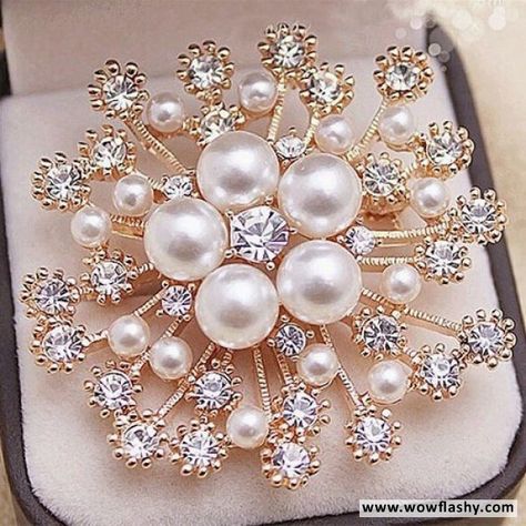 https://wowflashy.com/pearl-and-crystals-flower-brooch created of top quality metal. its embedded with crystal and pearl, perfect for all time. to add more classiness its designed like flower. #style #women #luxurywatch #luxurylifestyle #momgift #myfullluxury #luxuryqueen #greatgift #eastergift #partyideas Snowflake Party, Brooch Bouquets, Wedding Brooch, Rhinestone Wedding, Rhinestone Bridal, Ivory Pearl, Brooch Jewelry, Crystal Brooch, Pearl Brooch