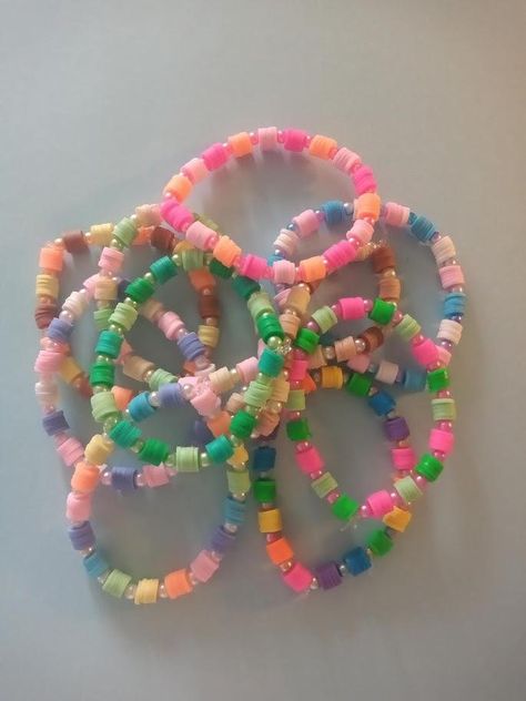 Made with clay beads, plastic pearls and an elastic string. Not made for children under 3 years old, small parts could be a choking hazard. Preppy Friendship Bracelets, Clay Beaded Bracelets, Pastel Preppy, Bracelet Business, Bracelets Friendship, Friendship Party, Handmade Gifts For Her, Clay Beads, Party Favor