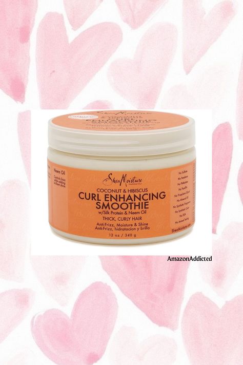 A jar of Shea Moisture Coconut and Hibiscus Curl Enhancing Smoothie, a creamy white hair product, with a vibrant label featuring coconuts and hibiscus flowers. The jar is set against a clean, white background, showcasing the product's tropical-inspired design and its promise of enhancing and defining curly hair. Shea Moisture Coconut And Hibiscus, Shea Moisture Coconut, Curl Enhancing Smoothie, Coconut Hibiscus, Shea Moisture, Curl Pattern, Neem Oil, Defined Curls, Male Grooming