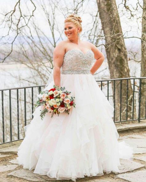 Stunning bride wearing Morilee by Madeline Gardner style 2815 Wedding Dress. A Strapless Crystal Beaded Sweetheart Neckline Bodice onto a flounced Organza Ball Gown skirt of ruffles. Photo by Woven Bone Photography. Wedding Dresses For Plus Size, Plus Size Ball Gowns, Fort Wedding, Elegant Ball Gown Wedding Dress, Dresses For Plus Size, Plus Size Ball Gown, Plus Wedding Dresses, Madeline Gardner, Elegant Ball Gowns