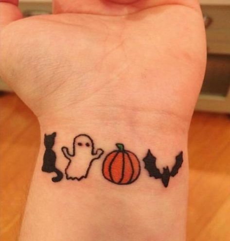 Cute tiny ghost, cat, pumpkin and bat tattoos on the wrist  Oh my God this is so cute. Berg Tattoo, Cute Halloween Tattoos, Tattoos Color, Tattoo Halloween, Pumpkin Tattoo, Tattoos Simple, Dibujos Tattoo, Bat Tattoo, Ghost Tattoo