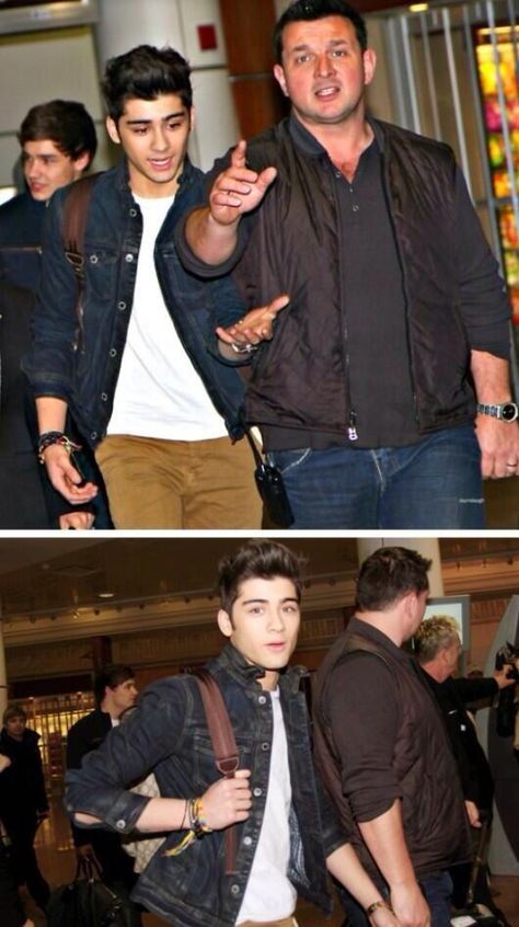 Zayn Malik from One Direction holding bodyguard Paul's hand.>>>> awwwww! Zany's face on the top is like "HEY!" Paul Higgins, One Direction Images, Zayn Malik Pics, Ill Miss You, One Direction Photos, One Direction Humor, One Direction Memes, One Direction Videos, One Direction Pictures