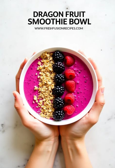 A vibrant Dragon Fruit Smoothie Bowl topped with blackberries, raspberries, and granola, held in two hands against a light background. Fruit Smoothie Bowl, Dragon Fruit Smoothie Bowl, Dragon Fruit Smoothie, Fruit Bowls, Smoothie Bowls, Perfect Breakfast, Smoothie Bowl, Dragon Fruit, Fruit Bowl