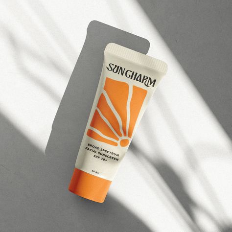 A bright sunscreen tube packaging design for a sunscreen brand. Luxury Sunscreen Packaging, Sunscreen Packaging Ideas, Cute Sunscreen Packaging, Sunscreen Branding Design, Spf Packaging Design, Sunscreen Bottle Design, Sun Screen Packaging Design, Sunscreen Package Design, Sunscreen Graphic Design