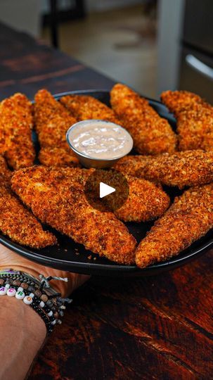 525K views · 41K reactions | 🔥 75 Cal Crispy Chicken Tender w/ Low Cal Garlic Parmesan Sauce

📍 Everything about this recipe from the crispy chicken tenders to the low cal garlic parmesan sauce! Banger!

✅ Macros for each Chicken Tender:
75 Cals, 5.5g Carbs, 1g Fat, 11g Protein

✅ Macros for the Whole Batch Garlic Parmesan Sauce:
212 Cals, 9g Carbs, 12g Fat, 17g Protein

✳️ Ingredients for Chicken Tenders (makes 16):
1.5lb Chicken Breast cut into Tenders
40g All Purpose Flour
10g Corn Starch
60g Panko
100g Egg Whites
30g Franks Red Hot Buffalo Sauce

✳️ Seasoning Mix (need two different batches of this):
2 tsp Garlic Powder
2 tsp Paprika
1 tsp Sea Salt
1 tsp Black Pepper
1 tsp Onion Powder
1 tsp Chili Powder

✳️ Ingredients for Low Cal Garlic Parmesan Sauce:
120g Plain Non Fat Greek Yogu Franks Red Hot Buffalo Sauce, Protein Macros, Protein Ingredients, Garlic Parmesan Sauce, Crispy Chicken Tenders, Fry Chicken, Franks Red Hot, Chicken Tender, Chicken Treats