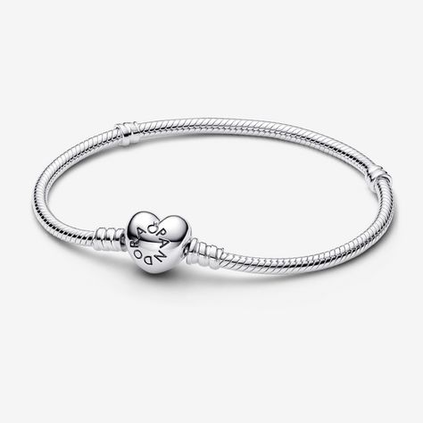 Set your heart a-flutter with this romantic version of Pandora's bestselling charm bracelet. Hand-finished with a heart-shaped clasp, this sterling silver snake chain bracelet looks stunning on its own but even better adorned with your favorite Pandora charms and clips. Layer it with contrasting Pandora chain bracelets for a chic, multi-layered look. - Pandora Moments Heart Clasp Snake Chain Bracelet - Sterling silver - Sz. 9.1 in Pandora Heart Bracelet, Pandora Chain Bracelet, Silver Pandora Bracelet, Dream Bracelet, Pandora Heart, Charms Pandora, Bracelet Pandora, Pandora Hearts, Snake Chain Bracelets