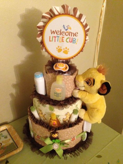 lion king diaper cake | Pinned by migdalia diaz Lion King Diaper Cake, Simba Baby Shower, Pamper Cake, Lion Baby Shower, Baby Boy Birthday Cake, Lion King Baby Shower, Lion King Baby, Lion Baby, Disney Baby Shower