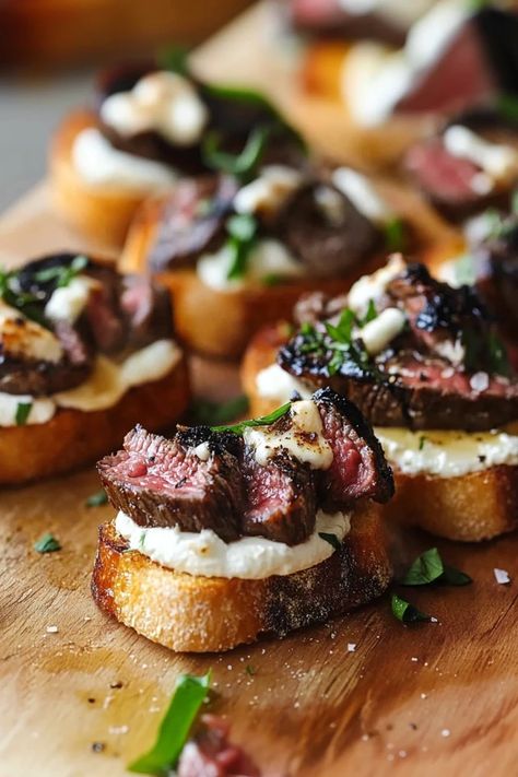 Looking for the ultimate snack or appetizer? These Steak Crostini are the perfect blend of savory steak, crispy bread, and flavorful toppings. Whether you're hosting a party or craving a quick gourmet bite, this recipe is sure to impress. Whip up something special – get the recipe now! #steakcrostini #appetizerideas #partyfood #quickrecipes #snackrecipes #easyentertaining #steakrecipes #smallbites #deliciousfood #savorysnacks Crostini Appetizers Garlic, Beef Skewer Appetizers, Black Tie Appetizers, Steak Crostini Chimichurri, London Broil Appetizer, Fancy Restaurant Appetizers, Dinner Hors D’oeuvres, Filet Mignon Crostini, Flank Steak Crostini