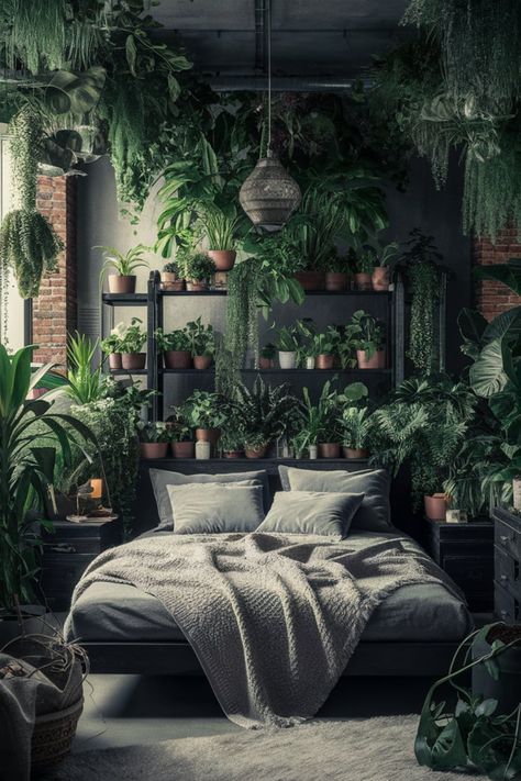 Create an urban jungle vibe in your bedroom with an abundance of plants and industrial decor. Use metal accents, exposed brick walls, and dark wood to add a modern touch, while cozy textiles keep the space inviting and relaxing.#UrbanJungle #BedroomDecor #IndustrialStyle #IndoorPlants #CozyInteriors #ModernDecor Bedroom With Plants, Urban Jungle Bedroom, Jungle Bedroom, Cozy Living Spaces, Bedroom Plants, Exposed Brick Walls, Brick Walls, Lush Greenery, Courtyard Garden