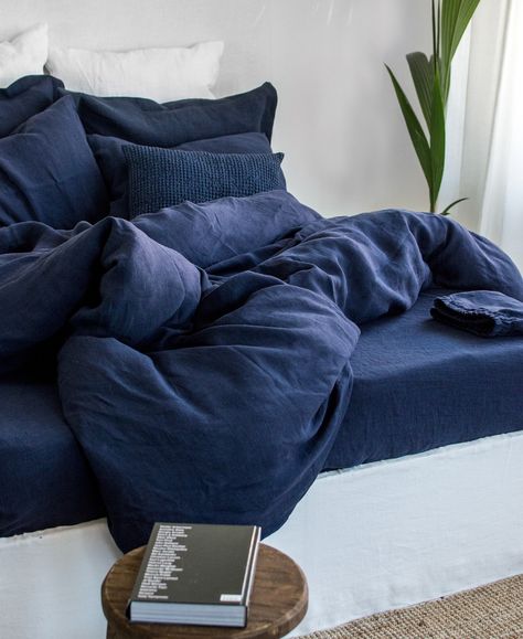 "Take a deep breath of midnight air and rest in comfort with this wonderful midnight blue linen duvet cover. It features natural linen fabric that is especially soft for the skin, highly absorbent, fully breathable that will ensure good night sleep, all year round. Fully breathable, anti-allergic, ultradurable and 100% natural. Handcrafted with care in Lithuania from premium local linen. This midnight blue duvet cover matches perfectly in color with our midnight blue pillowcases, bed sheets, waffle blanket, coverlet selection. Create a bundle to match your own taste and make your bedroom special! DETAILS ✓ Midnight blue color ✓ Custom design ✓ Wooden buttons ✓ Insert's corner ties ✓ Made from 100% natural linen ✓ Stonewashed, naturally softened ✓ Professionally handcrafted in Lithuania SIZ Deep Blue Bed Sheets, Navy Blue Bed Set, Navy Bedding Aesthetic, Dark Blue Duvet Cover, Neutral Navy Bedroom, Navy Bed Sheets, Green Blue Bedding, Blue Bedsheet Aesthetic, Navy Blue Apartment Aesthetic