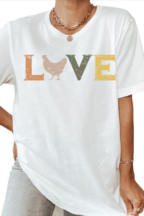 This simple distressed design is perfect for the chicken lover! Pair with favorite jeans or shorts! This shirt makes a wonderful gift for the chicken owner in your life! Chicken Owner, Chicken Gifts, Chicken Shirts, Chicken Lovers, Favorite Jeans, Gifts For Women, Chicken, T Shirt, Gifts