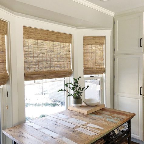 These kitchen windows have been perfectly covered with Wood Woven Shades from Select Blinds! • Mindfully Gray  #selectblinds #wovenwoodshades #kitchendecor #kitchenideas #kitchentable #whitecabinets Mindfully Gray, Bamboo Window Shades, Woven Blinds, Select Blinds, Woven Wood Shades, Bamboo Blinds, Kitchen Blinds, Bamboo Shades, Woven Wood