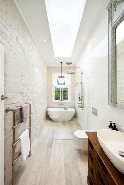 Maximize your bathroom with these tips and ideas for small bathroom spaces. This is the solution... #smallbathroomdecorideas #smallbathroomdecorating #smallbathroomdecorating #smallmodernbathroom Long Narrow Bathroom Layout, Long Bathroom Design, Narrow Bathroom Layout, Scandinavian Bathrooms, Long Narrow Bathroom, Minimal Bathrooms, Narrow Bathroom Designs, Boho Bathrooms, Design Interior Baie