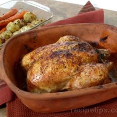 Clay Pot Baked Chicken Recipe Clay Pot Chicken Recipes, Romertopf Recipes, Clay Pot Cooking Recipes, Clay Cookware, Baking Dish Recipes, Oven Roasted Whole Chicken, Candied Yams Recipe, Whole Baked Chicken, Tagine Cooking