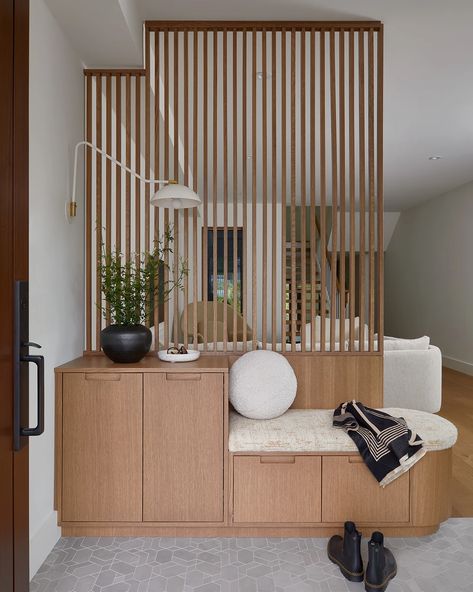 Project Sherwood Park by Four Blocks South front entry bench and slat screen | Portfolio Front Entry Bench, Slatted Walls, Japanese Style Interior, Accent Wall In Kitchen, Modern Room Divider, Lobby Interior Design, House Staircase, Divider Design, Home Hall Design