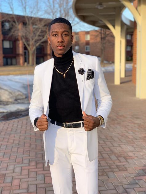 White suit, black turtleneck Prom Suits For Men Black Turtle Neck, White And Black Prom Suit, Matric Suits Men, Matric Ball Suits, White Turtleneck Outfit Men Formal, Turtleneck Suit Men Prom, Prom Suit Ideas For Black Men, Turtle Neck Outfit Men Suit Prom, Suit With Turtleneck Men